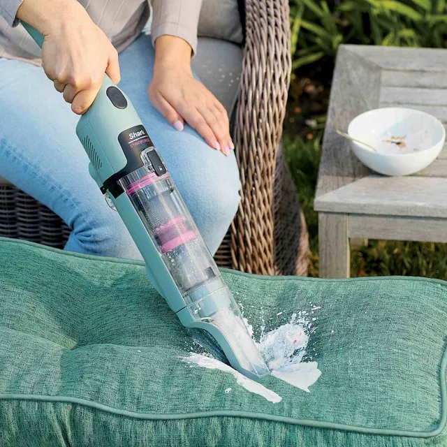 Outdoor cushion being cleaned